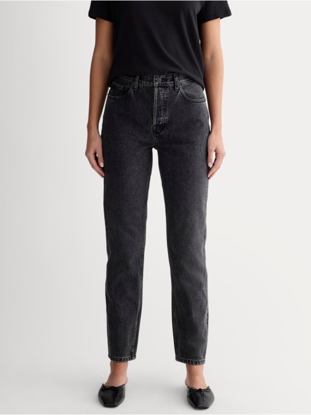 Everlane The '90s Cheeky Jeans in a washed black color, a high-rise waist